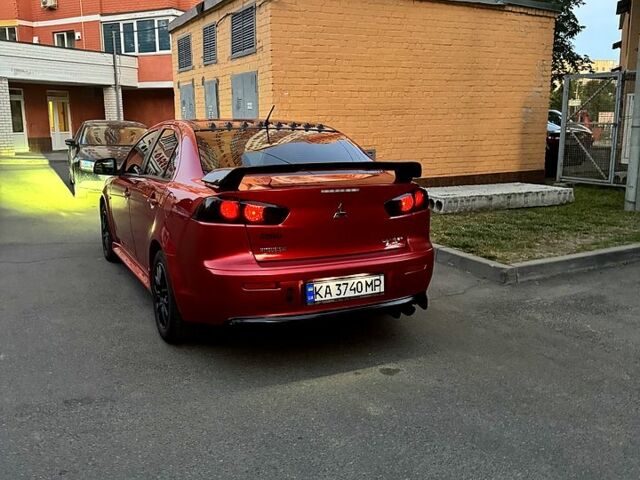 Красный Мицубиси Лансер, объемом двигателя 2 л и пробегом 260 тыс. км за 7300 $, фото 8 на Automoto.ua