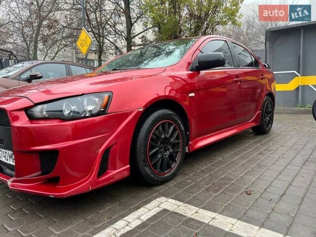 Красный Мицубиси Лансер, объемом двигателя 2 л и пробегом 230 тыс. км за 6700 $, фото 2 на Automoto.ua