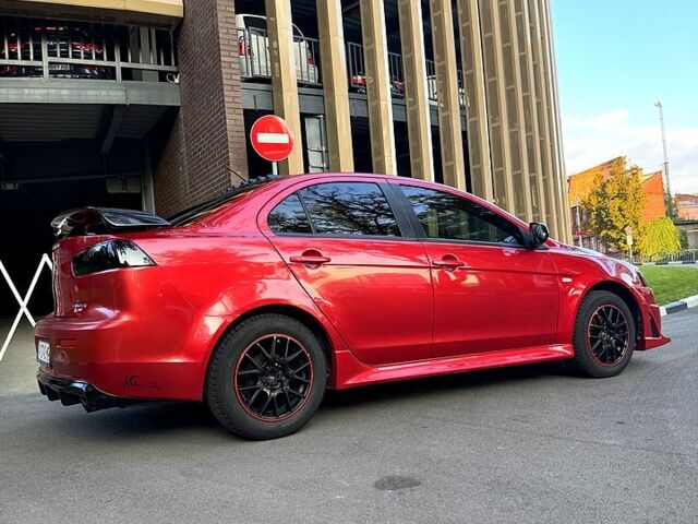 Мицубиси Лансер 2012 в Харькове на Automoto.ua Красный Мицубиси Лансер, объемом двигателя 2 л и пробегом 260 тыс. км за 6900 $, фото 2 на Automoto.ua