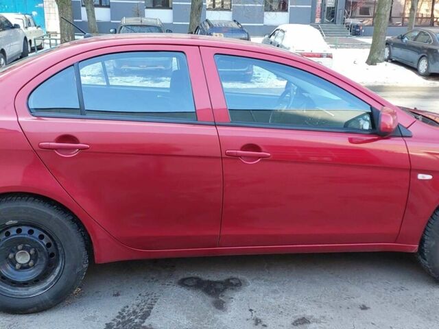 Червоний Міцубісі Lancer, об'ємом двигуна 1.59 л та пробігом 244 тис. км за 6600 $, фото 4 на Automoto.ua