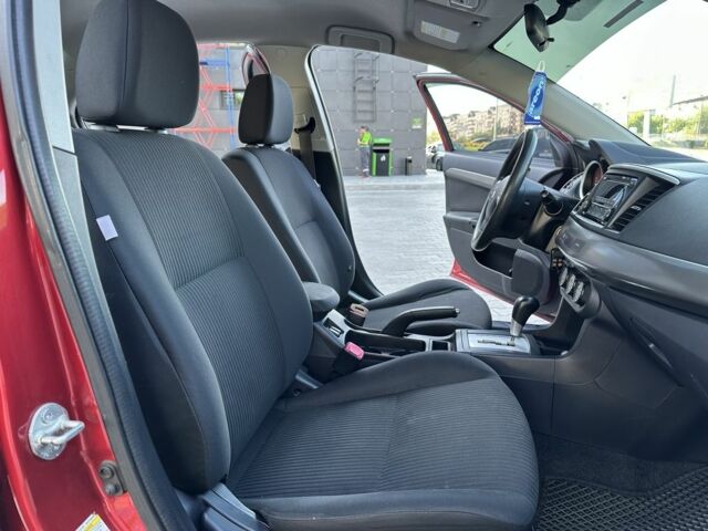 Красный Мицубиси Лансер, объемом двигателя 2 л и пробегом 185 тыс. км за 8699 $, фото 11 на Automoto.ua