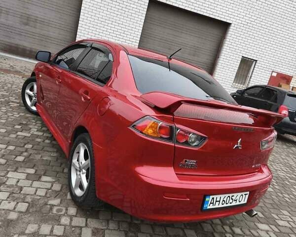 Червоний Міцубісі Lancer, об'ємом двигуна 2 л та пробігом 190 тис. км за 9700 $, фото 6 на Automoto.ua