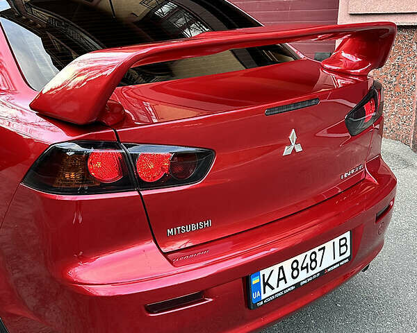 Червоний Міцубісі Lancer, об'ємом двигуна 1.6 л та пробігом 58 тис. км за 9000 $, фото 17 на Automoto.ua
