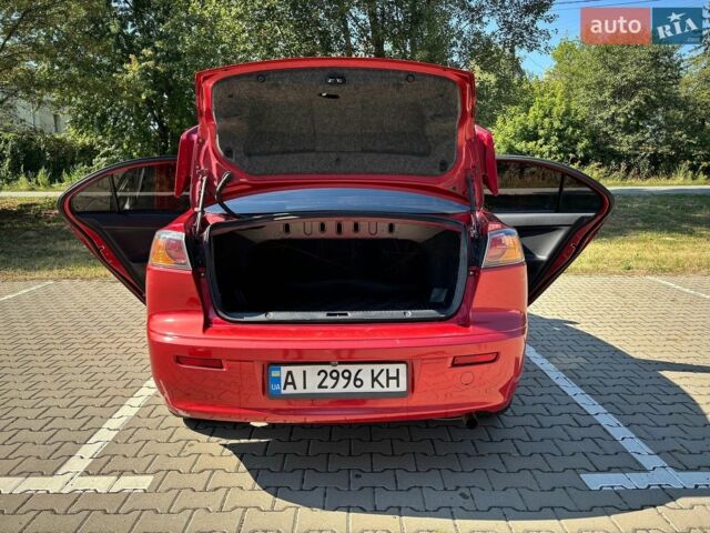 Червоний Міцубісі Lancer, об'ємом двигуна 2 л та пробігом 227 тис. км за 7800 $, фото 14 на Automoto.ua