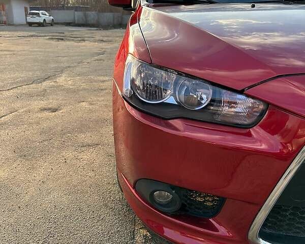 Червоний Міцубісі Lancer, об'ємом двигуна 2.4 л та пробігом 155 тис. км за 11000 $, фото 2 на Automoto.ua