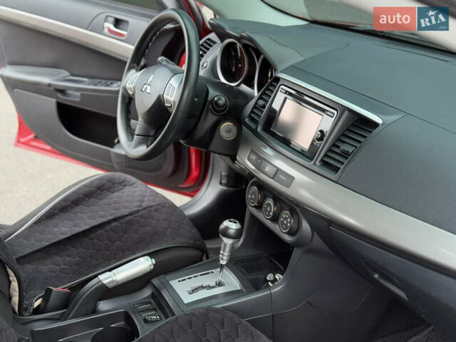 Червоний Міцубісі Lancer, об'ємом двигуна 2.36 л та пробігом 175 тис. км за 7999 $, фото 12 на Automoto.ua