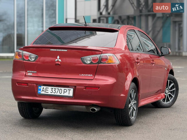 Червоний Міцубісі Lancer, об'ємом двигуна 2.36 л та пробігом 175 тис. км за 7999 $, фото 4 на Automoto.ua