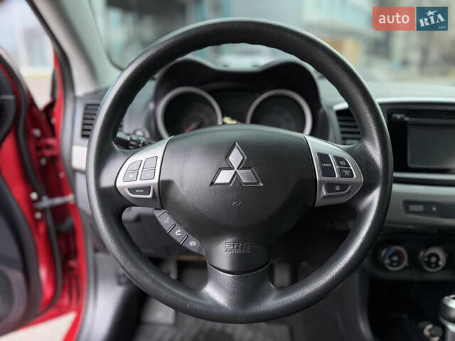 Червоний Міцубісі Lancer, об'ємом двигуна 2.36 л та пробігом 175 тис. км за 7999 $, фото 19 на Automoto.ua