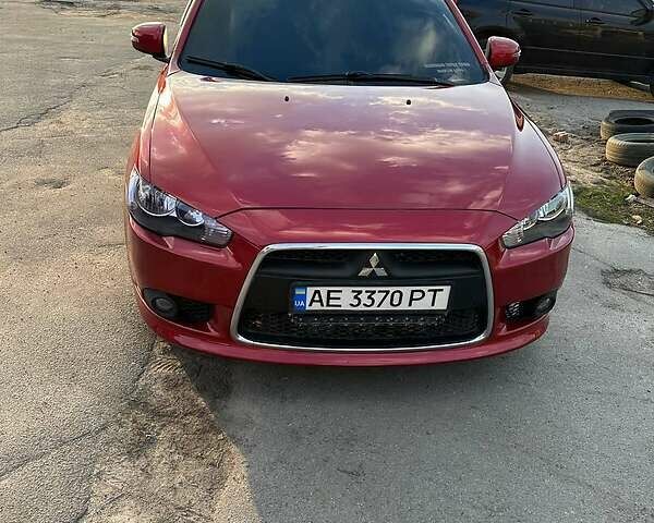 Червоний Міцубісі Lancer, об'ємом двигуна 2.4 л та пробігом 155 тис. км за 11000 $, фото 1 на Automoto.ua