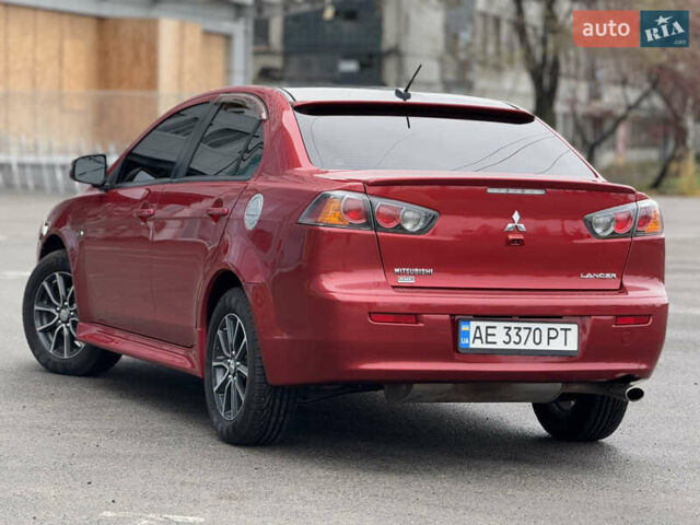 Червоний Міцубісі Lancer, об'ємом двигуна 2.36 л та пробігом 175 тис. км за 7999 $, фото 2 на Automoto.ua