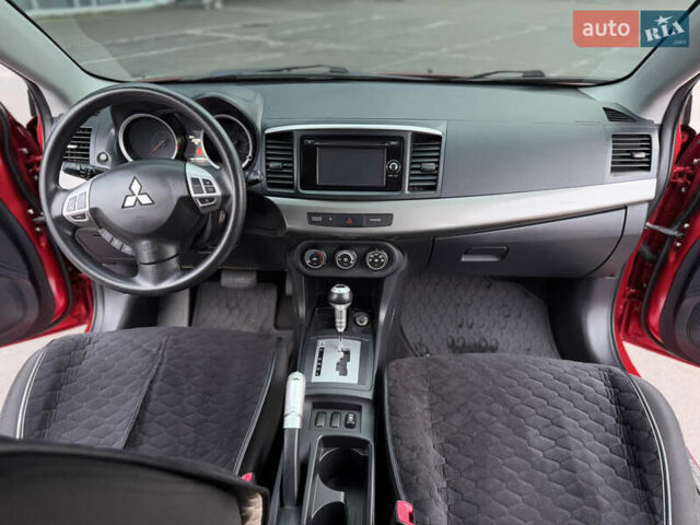 Червоний Міцубісі Lancer, об'ємом двигуна 2.36 л та пробігом 175 тис. км за 7999 $, фото 14 на Automoto.ua