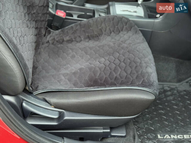 Червоний Міцубісі Lancer, об'ємом двигуна 2.36 л та пробігом 175 тис. км за 7999 $, фото 13 на Automoto.ua