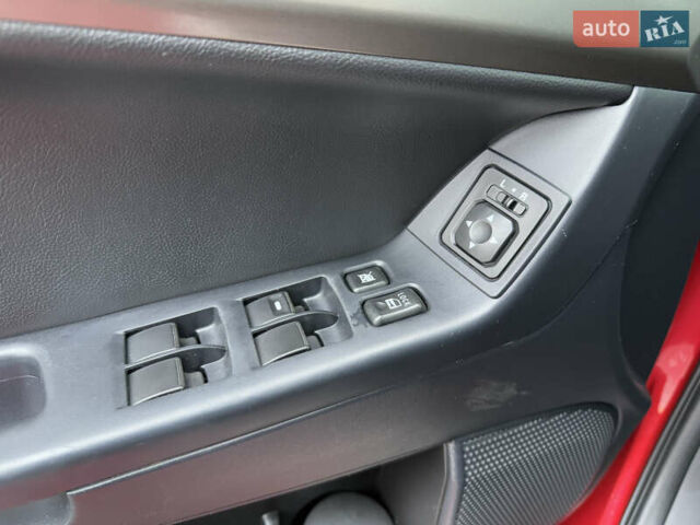 Червоний Міцубісі Lancer, об'ємом двигуна 2.36 л та пробігом 175 тис. км за 7999 $, фото 20 на Automoto.ua