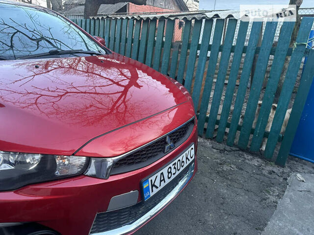 Червоний Міцубісі Lancer, об'ємом двигуна 2.36 л та пробігом 170 тис. км за 11000 $, фото 1 на Automoto.ua