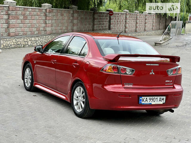 Червоний Міцубісі Lancer, об'ємом двигуна 2 л та пробігом 185 тис. км за 9700 $, фото 18 на Automoto.ua