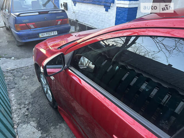 Червоний Міцубісі Lancer, об'ємом двигуна 2.36 л та пробігом 170 тис. км за 11000 $, фото 4 на Automoto.ua