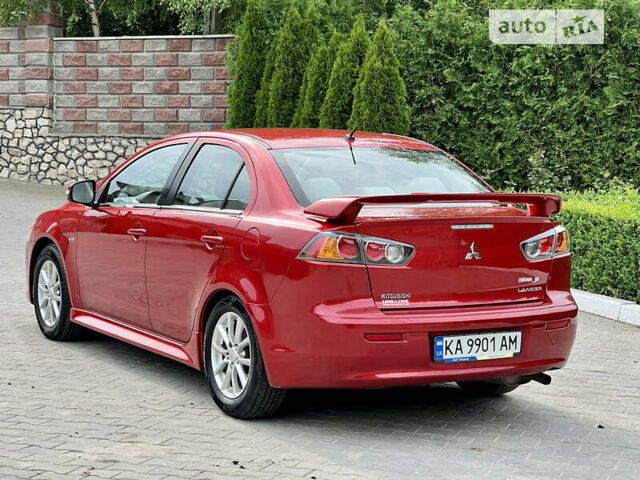 Червоний Міцубісі Lancer, об'ємом двигуна 2 л та пробігом 185 тис. км за 9700 $, фото 6 на Automoto.ua