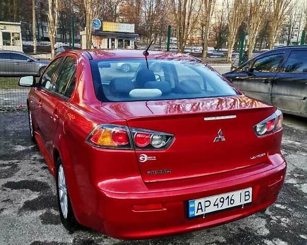 Червоний Міцубісі Lancer, об'ємом двигуна 2 л та пробігом 108 тис. км за 9400 $, фото 4 на Automoto.ua