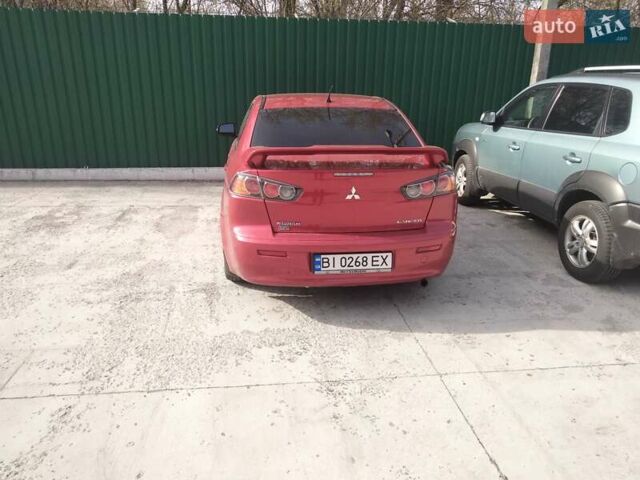 Червоний Міцубісі Lancer, об'ємом двигуна 2.4 л та пробігом 193 тис. км за 10200 $, фото 4 на Automoto.ua