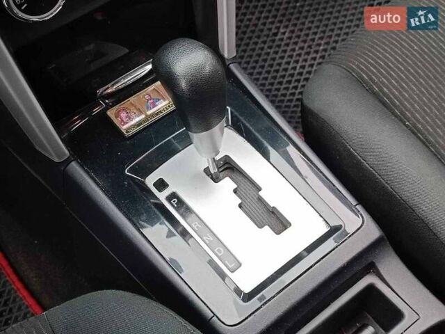 Червоний Міцубісі Lancer, об'ємом двигуна 2 л та пробігом 136 тис. км за 10990 $, фото 22 на Automoto.ua