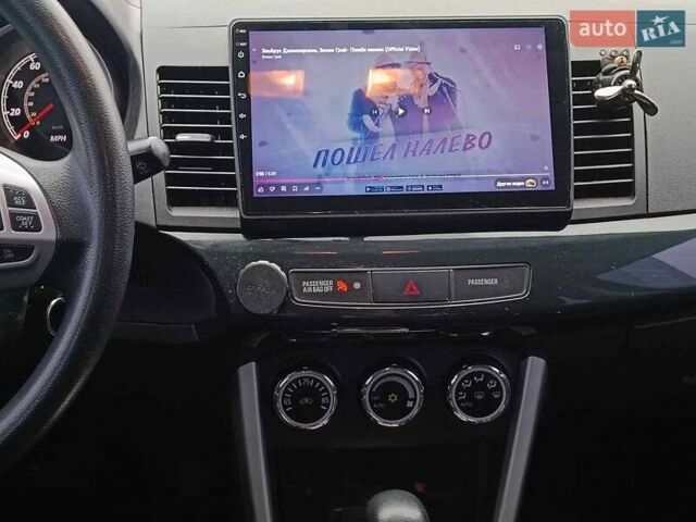 Червоний Міцубісі Lancer, об'ємом двигуна 2 л та пробігом 136 тис. км за 10990 $, фото 25 на Automoto.ua