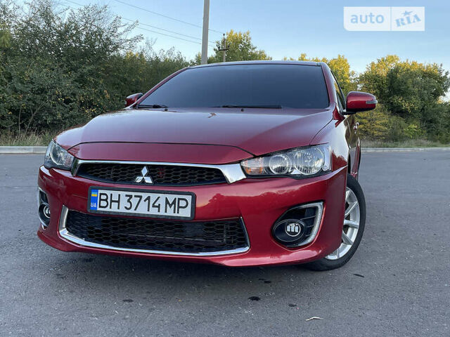 Червоний Міцубісі Lancer, об'ємом двигуна 2 л та пробігом 140 тис. км за 9900 $, фото 23 на Automoto.ua