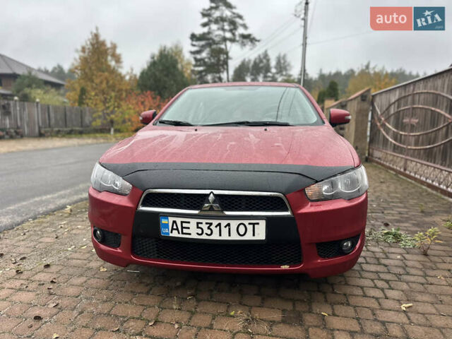 Красный Мицубиси Лансер, объемом двигателя 2 л и пробегом 70 тыс. км за 7950 $, фото 3 на Automoto.ua