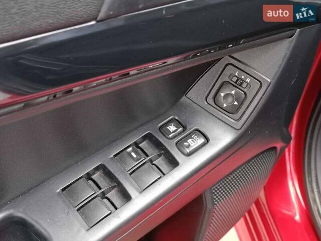 Червоний Міцубісі Lancer, об'ємом двигуна 2 л та пробігом 136 тис. км за 10990 $, фото 17 на Automoto.ua