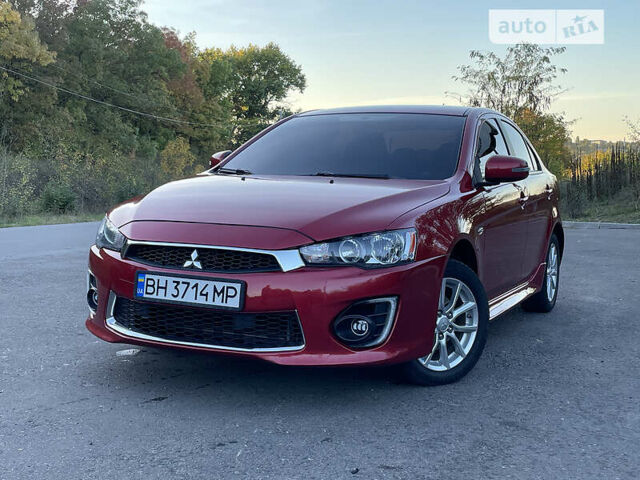 Червоний Міцубісі Lancer, об'ємом двигуна 2 л та пробігом 140 тис. км за 9900 $, фото 26 на Automoto.ua