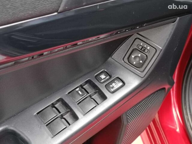 Красный Мицубиси Лансер, объемом двигателя 2 л и пробегом 136 тыс. км за 10990 $, фото 16 на Automoto.ua
