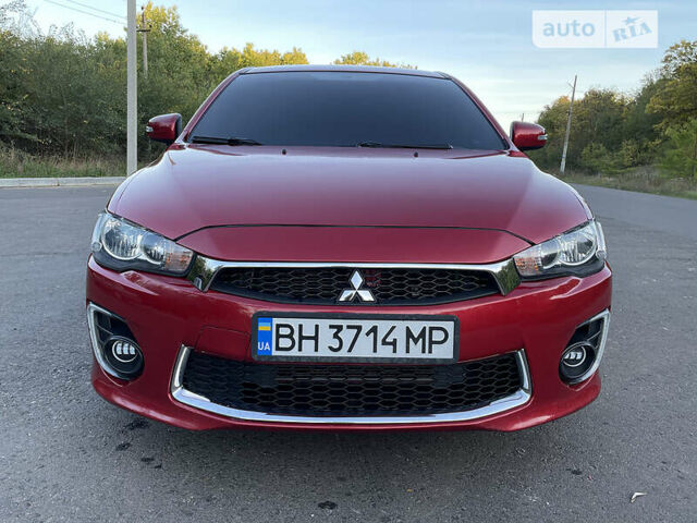 Червоний Міцубісі Lancer, об'ємом двигуна 2 л та пробігом 140 тис. км за 9900 $, фото 7 на Automoto.ua