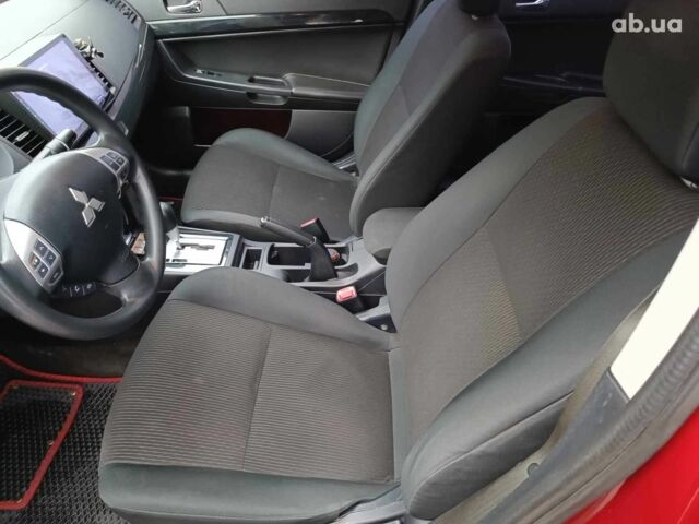 Красный Мицубиси Лансер, объемом двигателя 2 л и пробегом 136 тыс. км за 10990 $, фото 15 на Automoto.ua