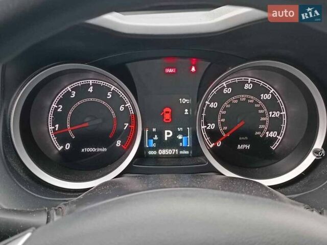 Червоний Міцубісі Lancer, об'ємом двигуна 2 л та пробігом 136 тис. км за 10990 $, фото 16 на Automoto.ua