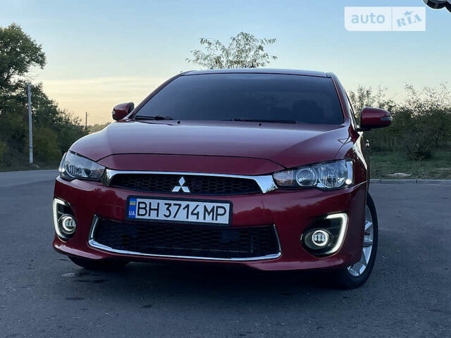 Червоний Міцубісі Lancer, об'ємом двигуна 2 л та пробігом 140 тис. км за 9900 $, фото 38 на Automoto.ua