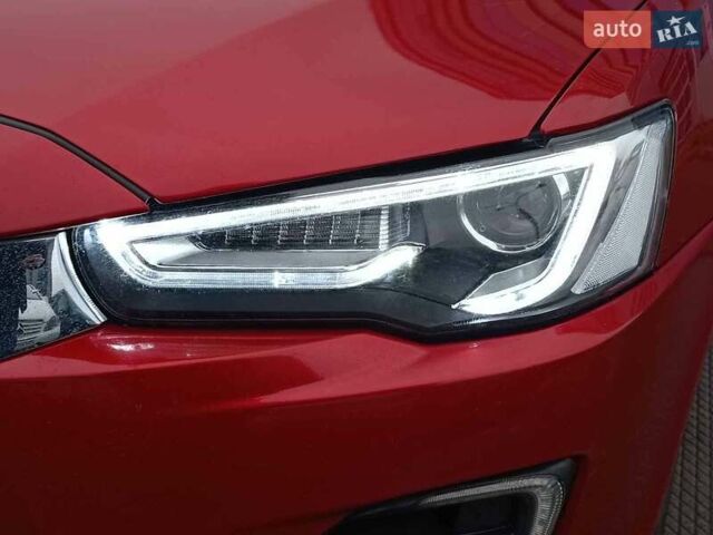 Червоний Міцубісі Lancer, об'ємом двигуна 2 л та пробігом 136 тис. км за 10990 $, фото 4 на Automoto.ua