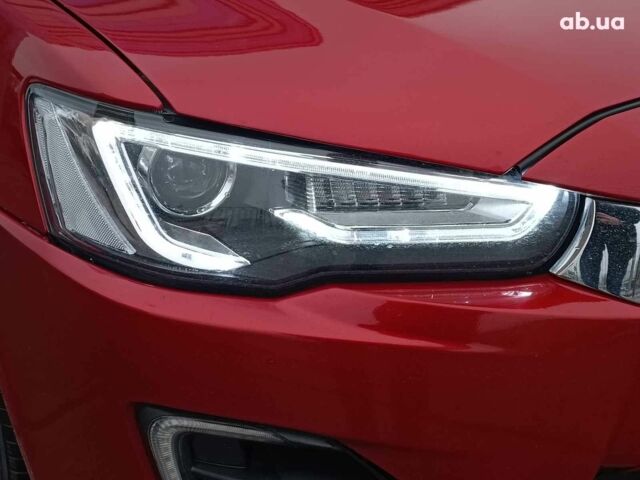 Красный Мицубиси Лансер, объемом двигателя 2 л и пробегом 136 тыс. км за 10990 $, фото 3 на Automoto.ua