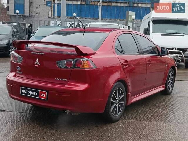 Червоний Міцубісі Lancer, об'ємом двигуна 2 л та пробігом 136 тис. км за 10990 $, фото 10 на Automoto.ua