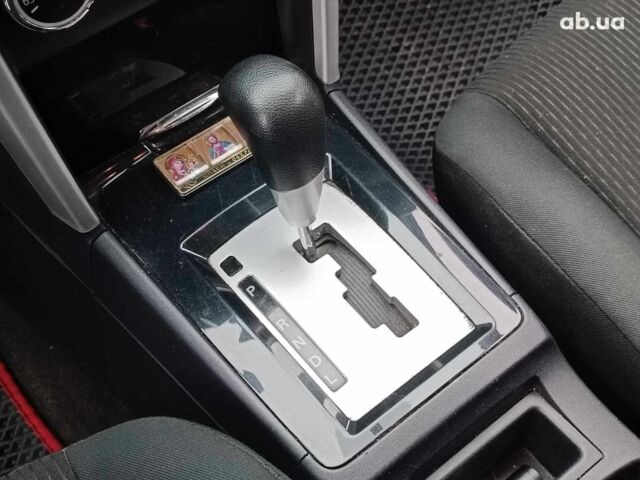 Красный Мицубиси Лансер, объемом двигателя 2 л и пробегом 136 тыс. км за 10990 $, фото 22 на Automoto.ua