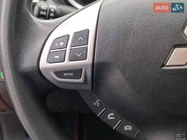 Червоний Міцубісі Lancer, об'ємом двигуна 2 л та пробігом 136 тис. км за 10990 $, фото 19 на Automoto.ua