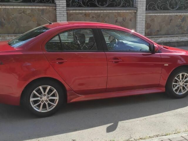 Червоний Міцубісі Lancer, об'ємом двигуна 2 л та пробігом 108 тис. км за 9200 $, фото 3 на Automoto.ua