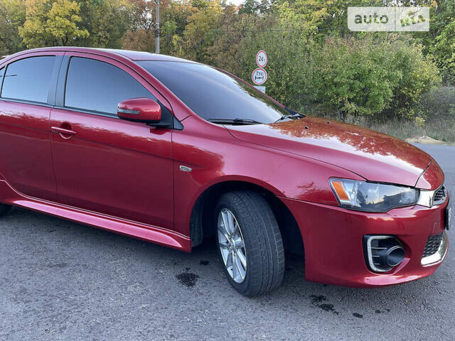 Червоний Міцубісі Lancer, об'ємом двигуна 2 л та пробігом 140 тис. км за 9900 $, фото 10 на Automoto.ua