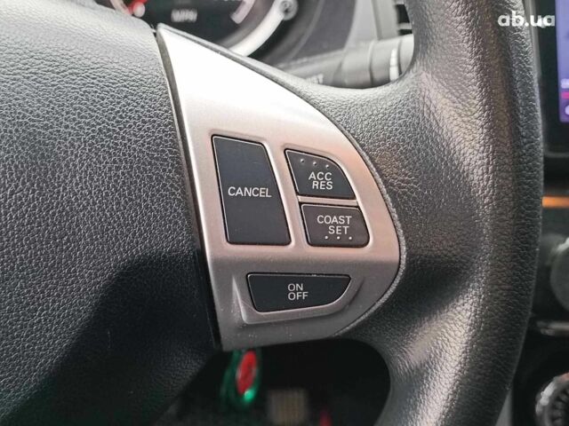 Красный Мицубиси Лансер, объемом двигателя 2 л и пробегом 136 тыс. км за 10990 $, фото 20 на Automoto.ua