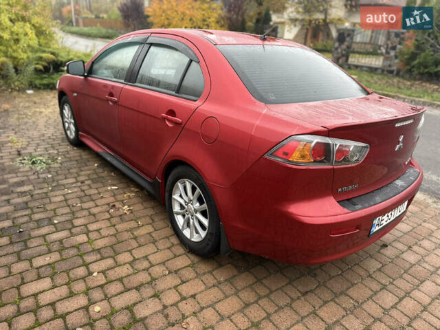 Красный Мицубиси Лансер, объемом двигателя 2 л и пробегом 70 тыс. км за 7950 $, фото 5 на Automoto.ua
