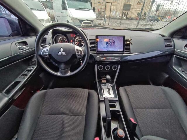 Красный Мицубиси Лансер, объемом двигателя 2 л и пробегом 136 тыс. км за 10990 $, фото 24 на Automoto.ua