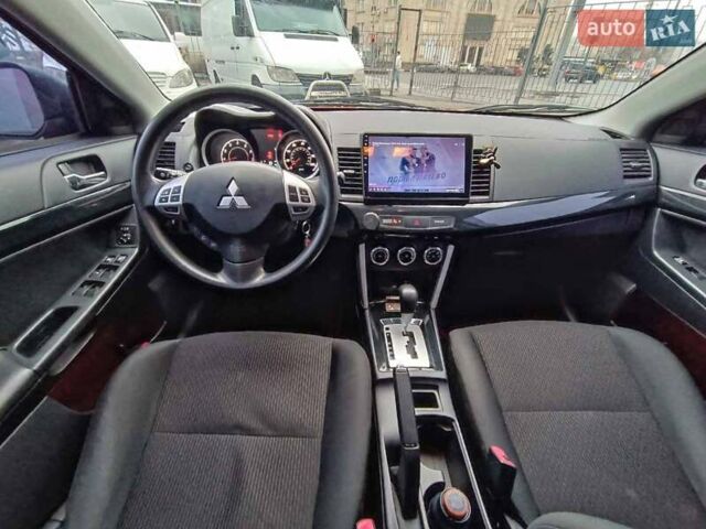 Червоний Міцубісі Lancer, об'ємом двигуна 2 л та пробігом 136 тис. км за 10990 $, фото 24 на Automoto.ua