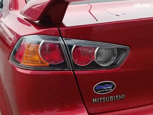 Красный Мицубиси Лансер, объемом двигателя 2 л и пробегом 136 тыс. км за 10990 $, фото 8 на Automoto.ua