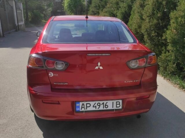 Червоний Міцубісі Lancer, об'ємом двигуна 2 л та пробігом 108 тис. км за 9000 $, фото 5 на Automoto.ua