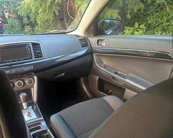 Мицубиси Лансер 2016 в Одессе на Automoto.ua Красный Мицубиси Лансер, объемом двигателя 2 л и пробегом 56 тыс. км за 12500 $, фото 24 на Automoto.ua