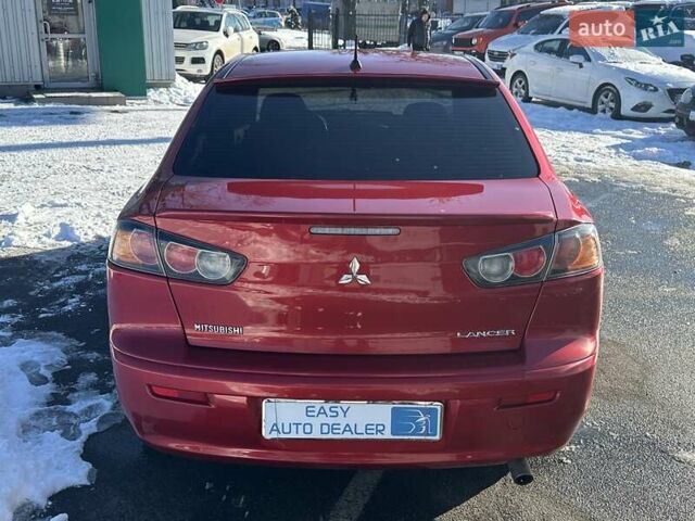 Червоний Міцубісі Lancer, об'ємом двигуна 2 л та пробігом 198 тис. км за 9690 $, фото 4 на Automoto.ua