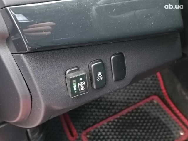 Красный Мицубиси Лансер, объемом двигателя 2 л и пробегом 136 тыс. км за 10990 $, фото 17 на Automoto.ua